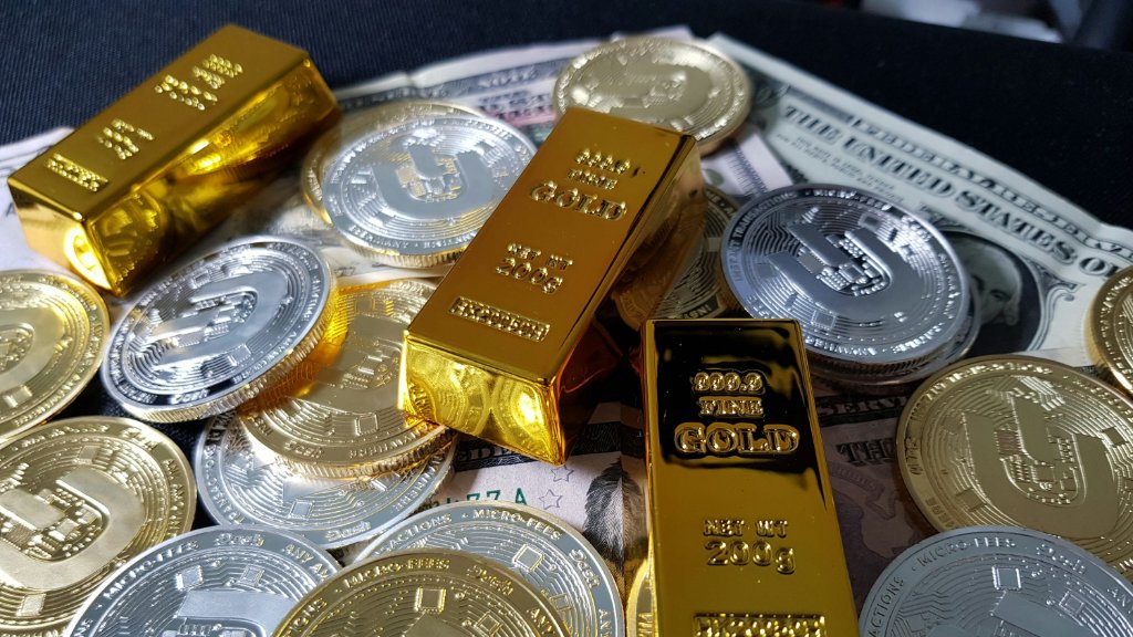 暂时获利回吐还是反转？金银期货转跌，现货白银历史性涨破50美元后回落